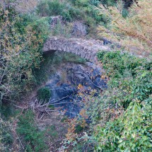 Old bridge on the path Cami del Rec northwest of La Selva